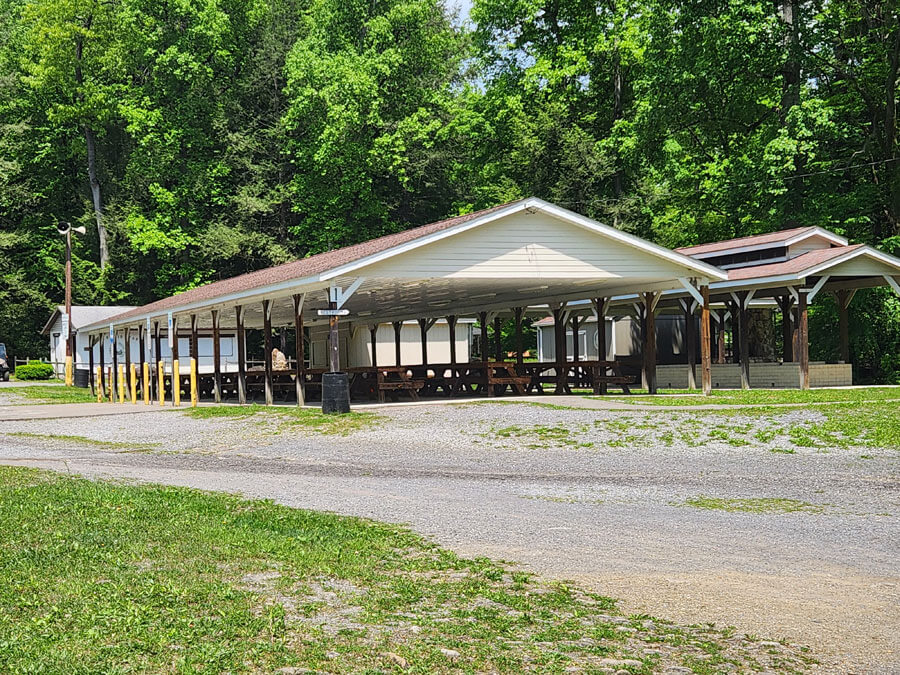 large pavilion with picnic tables.