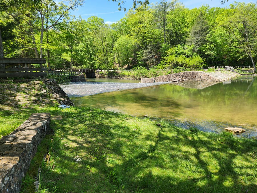 water flowing over the dam.