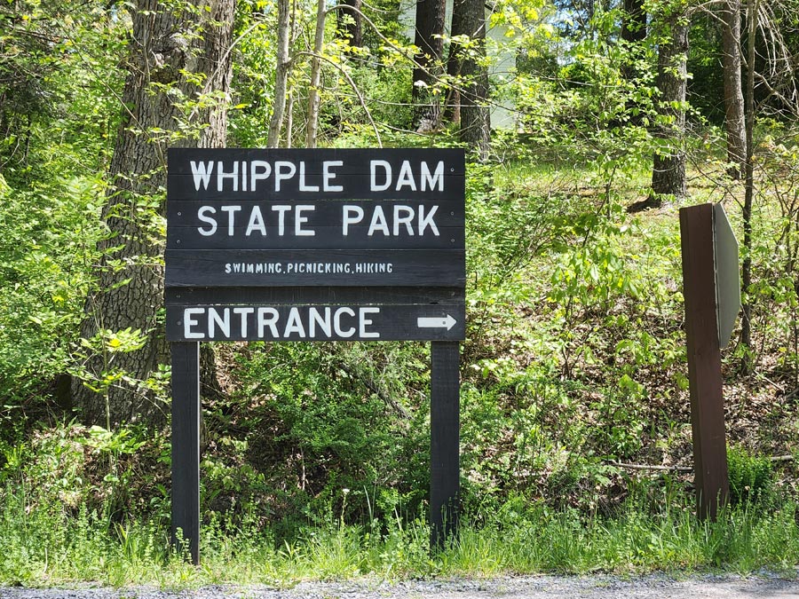 sign pointing the way to the entrance.
