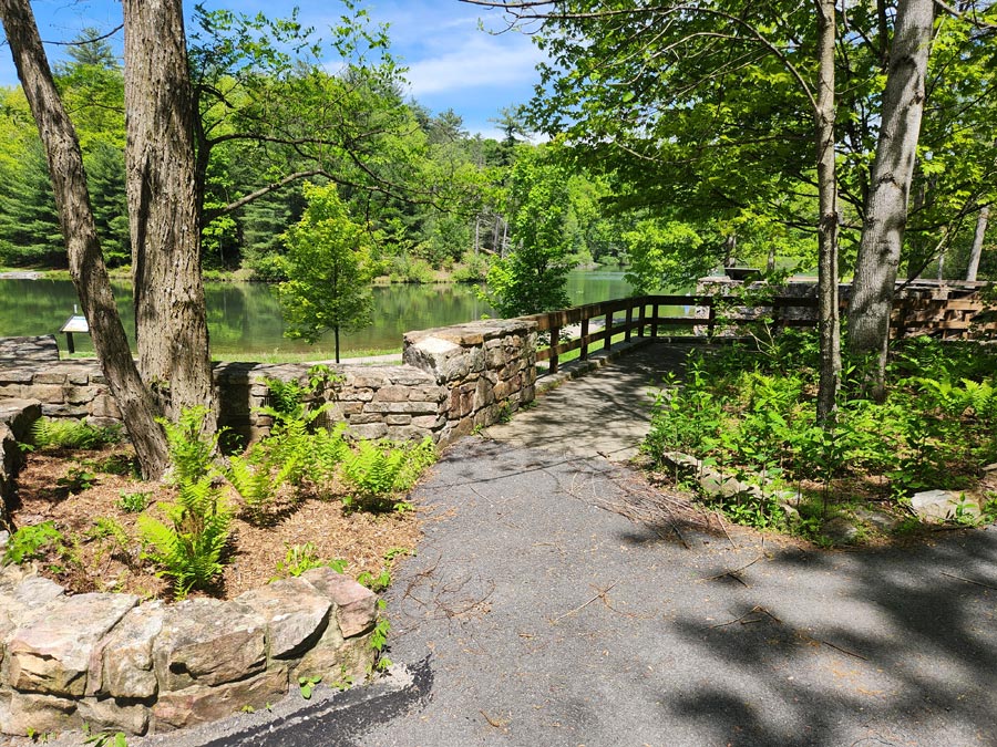 a fenced walkway above the beach.