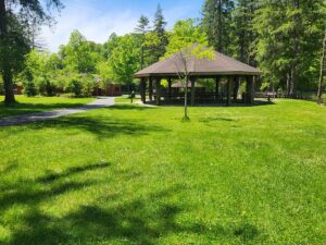 green space in front of a pavilion.