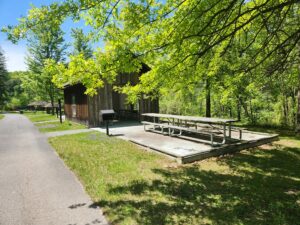 picnic tables beside a pavilion.