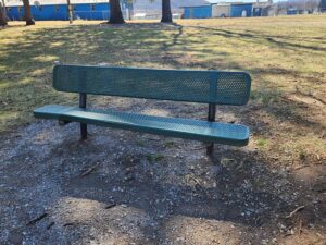 green metal bench.