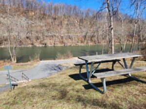 picnic table overlooking river.