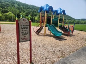 playground sign and slide.