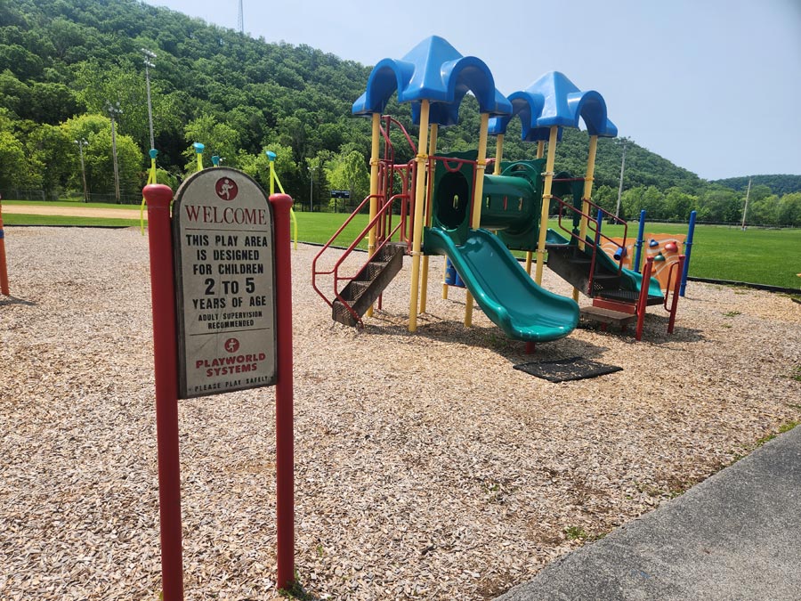 playground sign and slide.