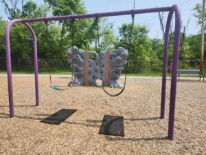 swings and a climbing wall.