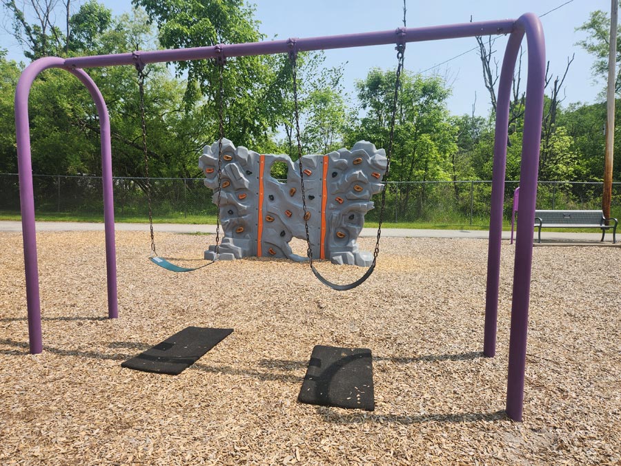 swings and a climbing wall.