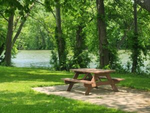 picnic table by river.