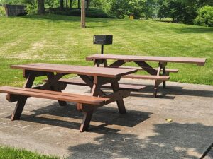 picnic tables and grill.